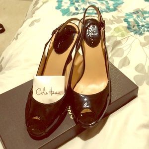 Black patent Cole Haan sling backs